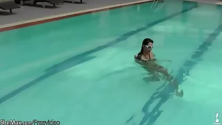 Fabulous t-girl poses in bikini poolside coupled in the matter of strips in shower